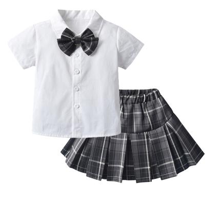 China ENGLAND STYLE factory manufacture various primary school uniforms design kids fringe skirt for sale