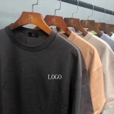 China Anti-Shrink High quality drop shoulder unisex t-shirts regular printed logo shorts sleeve oversized shirts custom blank t-shirts with logo for sale