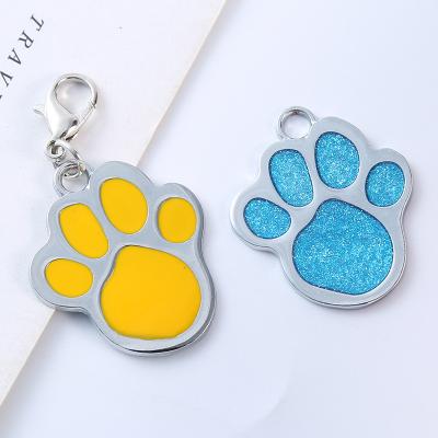 China Global Metal Pet Footprints Identify Cats And Dogs Collar Custom Wholesale Laser Engraving Pet Collar Alloy Service Dog Identification Tags for sale