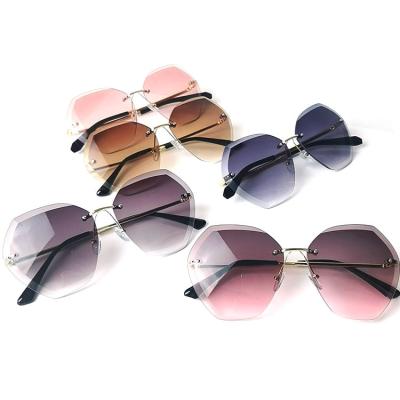 China Brand Designer High Quality Gradient Sun Glasses Rimless Female UV400 New Women Sunglasses 2021 Fashion Sunglasses for sale