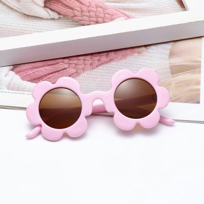 China Eyewear Merchant Fashion UV400 Cute Round Flower Shaped Plastic Sun Glass Frame Kids Sunglasses For Girls for sale