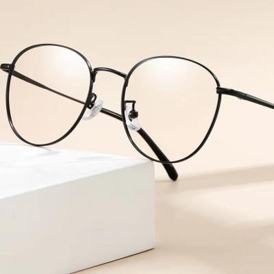 China Blue Light Blocking Glass Frame 2021 New Fashion Irregular Shapes Optical Frame Fashionable Metal Glasses Frame for sale