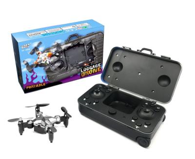 China 2.4G 4CH 8X8X3cm Remote Control Drone Mini Folding Portable Quadcopter Luggage Drone for sale