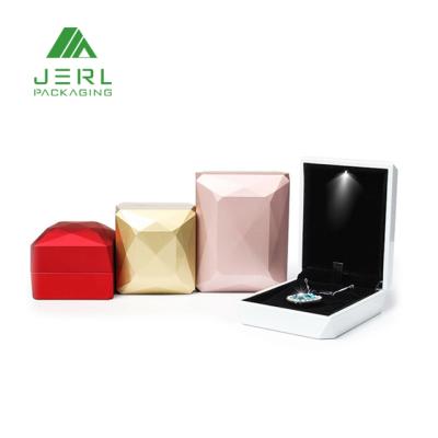 China Custom Plastic Jewelry Wedding Ring Jewelry Box With Led Light for sale