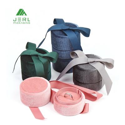 China Wholesale Jewelry Package Engagement Wedding Round Pink Velvet Ring Box With Ribbon for sale