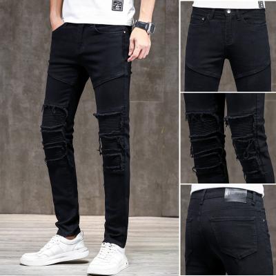 China Stylish Ripped/Ripped Men's Cargo Manufacturers Jeans NEW Breathable For Men Color Matching White Red Denim Pants for sale