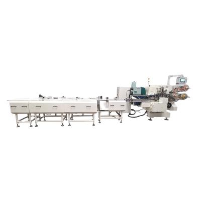 China High quality eco-friendly folding and multifunctional packing machine for packaging of chocolate pralines and compressed candy for sale