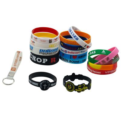 China Custom Printed Logo Size Design Cheap Promotional Items Silicone Wristband Debossed Filled Silicone Wristband for sale