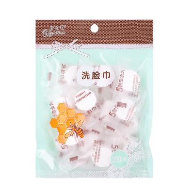 China 20 Towelettes Mini Compressed Towel Compressed Round Portable Nonwoven Cleaning Disposable Facial Massage for sale