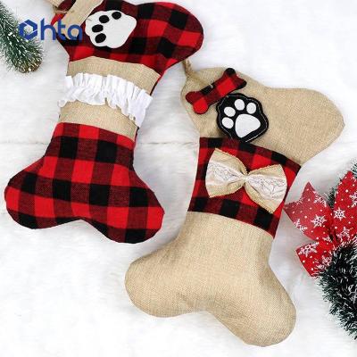 China HTA Christmas Biodegradable Christmas Decoration Supplies Bulk Christmas Plaid Dog Bone Red And Black Stocking for sale