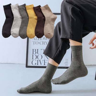 China Logo Make Own Design Winter Antibacterial Custom Business Men's Woolen Warm Socks for sale