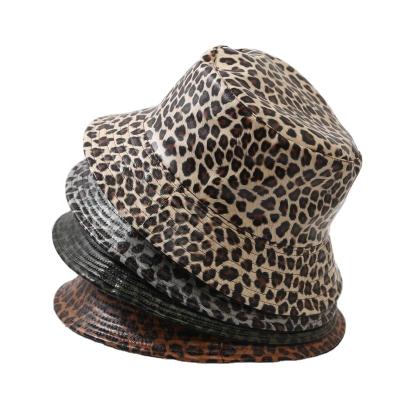 China European and American cute animal short brim fisherman leopard pattern bucket hat summer style sun protection leather double-sided hat for sale