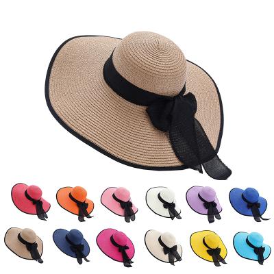 China Mesh Brim Straw Hat Elegant Wide Brim Sunscreen Hat Seaside Bow Foldable Bow Beach Women Barred Summer Protect Hat for sale