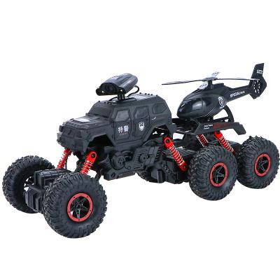 China Eco-friendly material Police Smash Truck Six-wheel 4X4 Shock Absorbers Vehicle Off-Road Climbing Remote Control Rc Car Toys With Airplane for sale