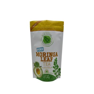 China Custom Moisture Proof Holder Up Pouch Smell Proof Biscuit Pouch Food Packaging Self Sealed Edible Plastic Bag For Moringa Leaf Tea for sale