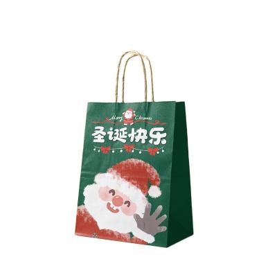 China 10 Pcs Christmas Paper Gift Bag Recyclable Wholesale Pack With Handle Santa Claus Paper Bags For Gift Clothing Food for sale