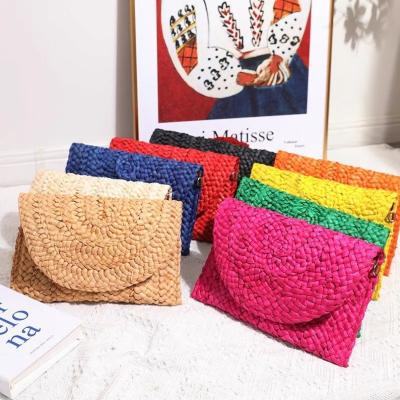 China Handmade Ladies Straw Clutch Beach Rattan Bag Summer Beach Straw Woven Women Handbags Waterproof for sale