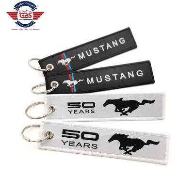 China Various Car Keys Car Logo Can Make Logo Embroidered Cloth Tape The Key Chain for sale