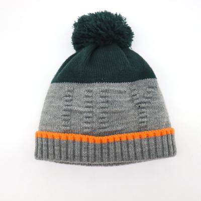 China JOINT Winter Youth Acrylic Jacquard Beanie Rib Custom Bottom With Warmer Fleece Striping Pom Pom Beanie for sale