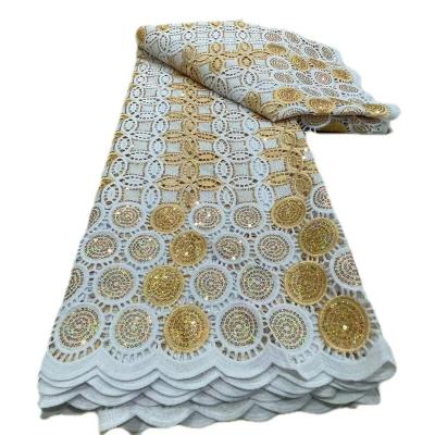 China Water Soluble Wholesale price latest pure white African guipure lace fabrics with gold sequins nigerian guipure cord bridal laces fabric for sale