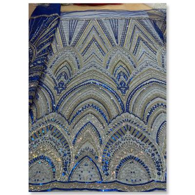 China Sustainable Royal Blue Handmade Embroidered Sequins and Beads Lace Fabric Luxury Sequence Mesh Lace for Wedding Dress for sale