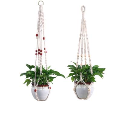 China Indoor Bohemian Home Decoration DIY Woven Cotton Rope Garden Flowerpot Pocket Popular Handmade Net Hanging Basket and Door for sale