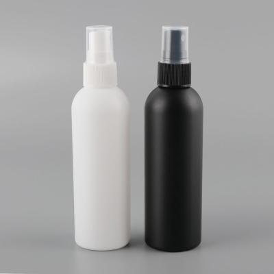 China Custom Packaging Plastic Spray Bottles 100ml HDPE Cylinder Black Cosmetic Sprayer for sale