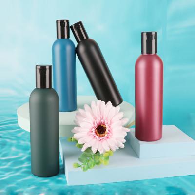 China Custom Cylinder Plastic Container Squeeze Bottle With Flip Top Cap 8 oz HDPE Shampoo Bottle Matte Bottle à venda