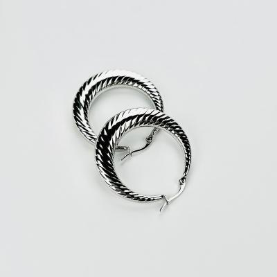 China Fashion Trendy Custom Women's Stainless Steel Circle Hoop Earrings Popular Silver Trendy Brands Luxury Designer Korean for sale