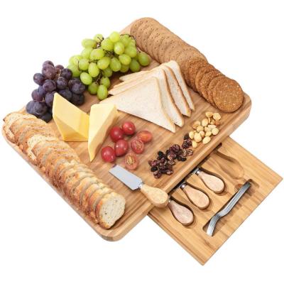 China Natural and eco-friend sustainable bamboo cheese cutting board for sale