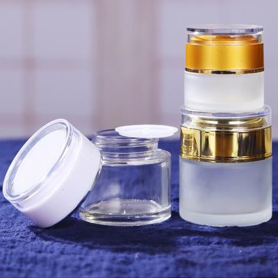 China 20g 30g 50g Skin Care Cream 20g 30g 50g Gold Lid Body Oil White Silver Face Eye Cream Clear Or Frost Glass Bottles Glass Jar for sale