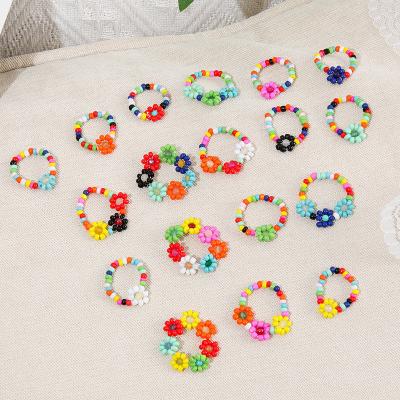 China Daisy Flower Adjustable Ring 2022 Summer Ring Set Stackable Elastic Rainbow Seed Handmade Mixed Bead Rings Daisy Flower Adjustable Ring for sale