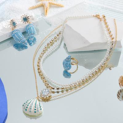 China Environmental Friendly Zircon Shell Conch Pendant Necklace Earring Ring Bling Jewelry Fashion Princess Mermaid Ocean Blue Pearl Set for sale