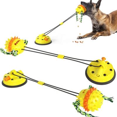 China Highly Strong Suction Cup Stocked Interactive Rubber Dog Toys With Bouncy Ball Teeth Cleaning Funny Chew Toy for sale