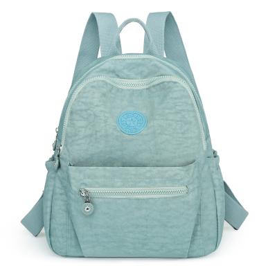 China High Quality Special Material Wholesale Waterproof Portable Mini Backpacks Adjustable Straps Women Girls University School Backpacks for sale