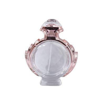 China New Perfume Bottle 80ml Cosmetic Press Glass Spray Bottle Flat Round Supply With Lace Empty Glass Bottles for sale