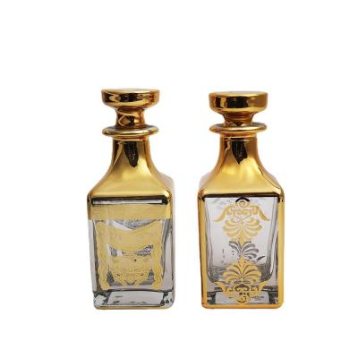 China Cosmetic Perfume Bottle Gold 150ml Perfume Display Bottle UV Cut Glass Perfume Display Bottles for sale