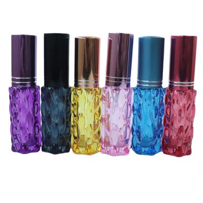 China Personal Care Factory Wholesale Unique Shape Small Glass Bottle 5ml 10ml 15ml 20ml 30ml Colored Glass Perfume Bottle for sale