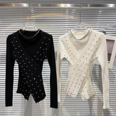 China Anti-Wrinkle Spring Halter V-Neck Sweater New Hollow-out Stone Beaded Slim Sweater Pullover Long Sleeve Knitted Sweater For Women for sale