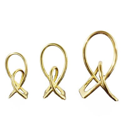 China China Modern Simple European Brass Crossed Circle Twist Ornaments Paperweight Home Office Sale Soft Ornaments for sale