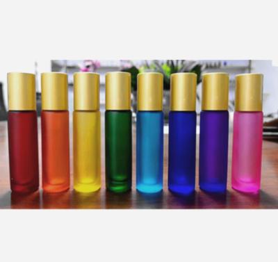 China Cosmetic Matte Pink / 10ml Rainbow Glass Roll On Bottle With Gold Matte Lid / Cap Perfume Essential Oil Bottle for sale