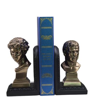 China Europe and America customized character sculptures, book holders, cold-melt copper resin crafts for office for sale