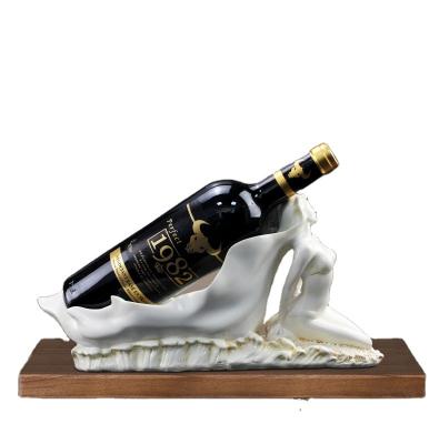 China Europe and America Customized Wine Shelf Creative Resin Woman Shape Practical Tabletop Storage Wine Rack for Living Room Restaurant Home Decor for sale