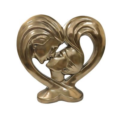 China Europe and America factory direct sales couples home decoration cold cast ornaments resin copper heart-shaped crafts for sale