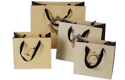 China Custom Logo Printing Shopping Paper Bags With Rope Handles for sale