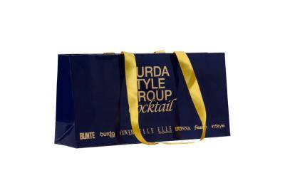 China Golden Ribbon Glossy Large Printed Paper Gift Bags Dark Blue For Shopping for sale