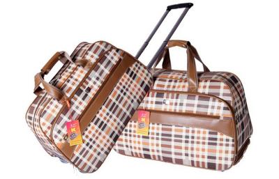 China Telescoping handle roller gear travel duffel bag for trip , rolling business cases for sale