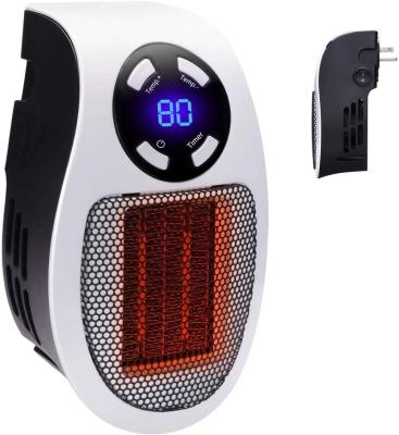 China Hot Sale Mini Heating Machine Portable Electric 500W Adjustable Hand Fan Heater Electric For Room Plug-in Mini Heater Plug for sale