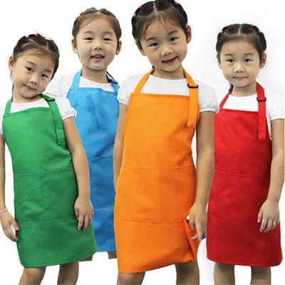 China 100% New Eco-friendly Apron Kids Cleaning Kitchens Cooking Painting Art Kids Baking Apron Keep Clean Pocket Bib for sale