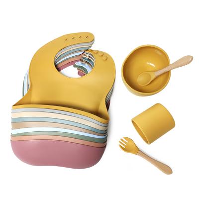 China Silicon Baby Dish Set Silicone Food Grade Feeding Set With Baby Food Feeder Feeder Spoon Dish And Bib New Silicone Feeding Set for sale